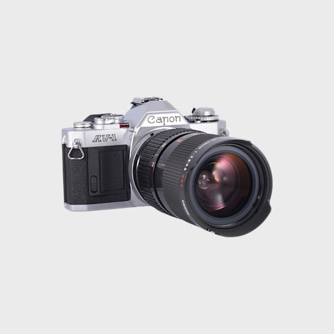 NOS: Canon AV-1 35mm SLR film camera with 35-70mm f2.8-3.5 lens