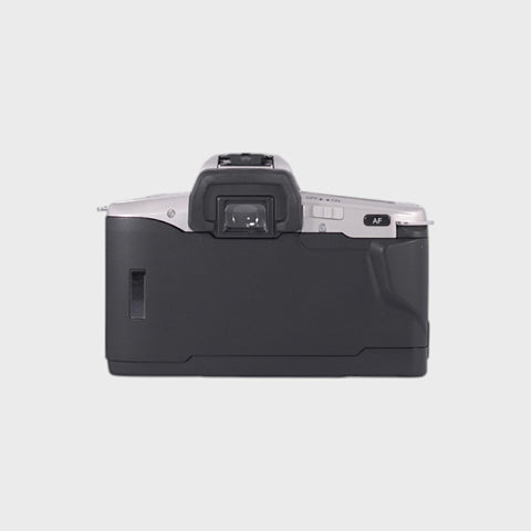 Minolta Dynax 3L Reflex 35mm argentique avec objectif 28-100mm