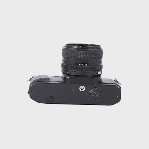 Canon T60 35mm SLR film camera with 28mm f2.8 lens