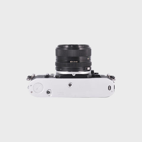 Canon AE-1 35mm SLR film camera with 28mm f2.8 lens
