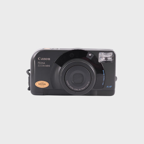 Canon Prima Zoom Mini Point & Shoot 35mm argentique avec objectif 38-76mm
