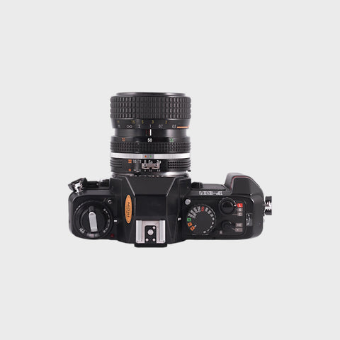 Nikon F-301 35mm SLR film camera with 35-70mm zoom lens