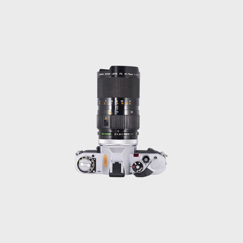 NOS: Canon AV-1 35mm SLR film camera with 35-70mm f2.8-3.5 lens