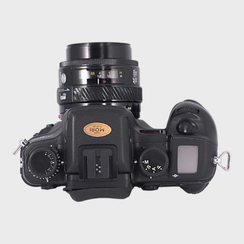 Minolta Dynax 9 35mm SLR film camera with 35-70mm f4 lens