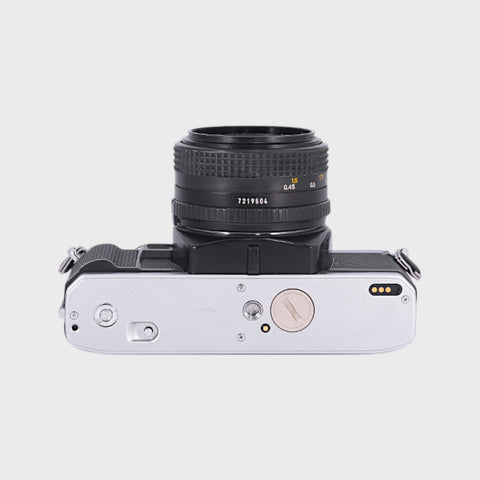 Minolta X-300 Reflex 35mm argentique avec objectif 50mm f1.7