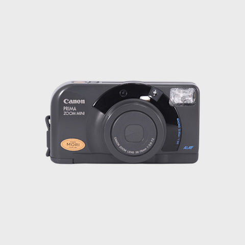Canon Prima Zoom Mini Point & Shoot 35mm argentique avec objectif 38-76mm
