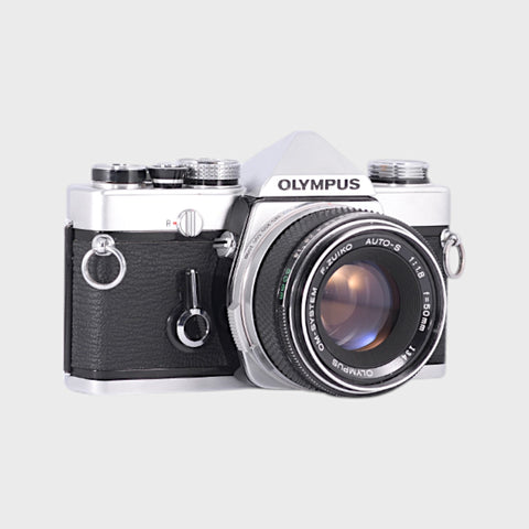 Olympus Om-1 Reflex 35mm argentique avec 50mm f1.8 objectif