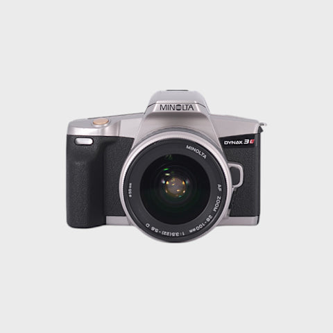 Minolta Dynax 3L Reflex 35mm argentique avec objectif 28-100mm