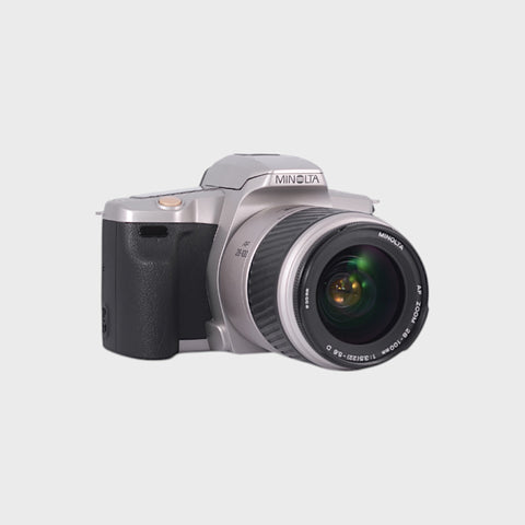 Minolta Dynax 3L Reflex 35mm argentique avec objectif 28-100mm