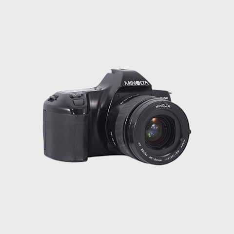 Minolta Dynax 3000i 35mm SLR film camera with 35-80mm zoom lens