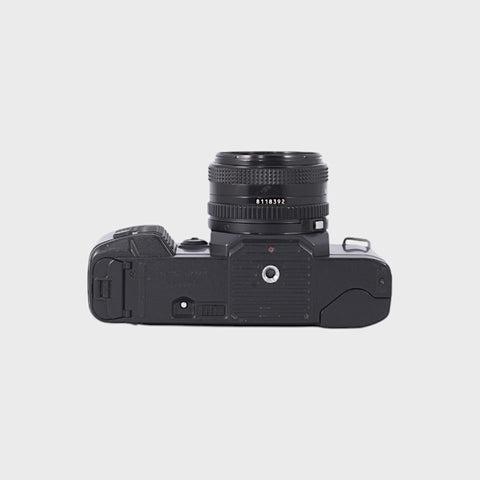 Canon T70 35mm SLR film camera with 50mm f1.8 lens
