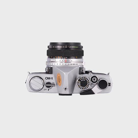 Olympus OM-1 Reflex 35mm argentique avec 50mm f1.8 objectif